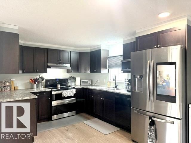 Property Photo: 1026 Lakeland Crescent AB T8H 1J2