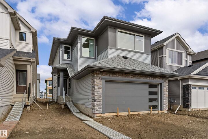 Property Photo: 5133 Cawsey Bend SW AB T6W 5Y5
