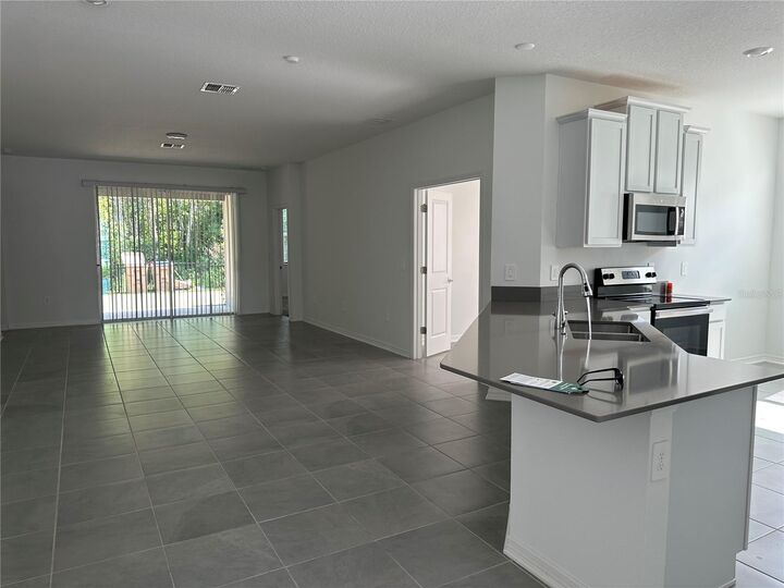 Property Photo: 4162 Babbling Brook Way A FL 34746