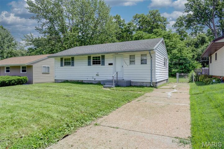 Property Photo:  10836 Spring Garden Drive  MO 63137 