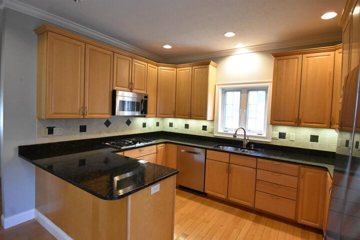 Property Photo:  2246 Elm Street  NH 03104 
