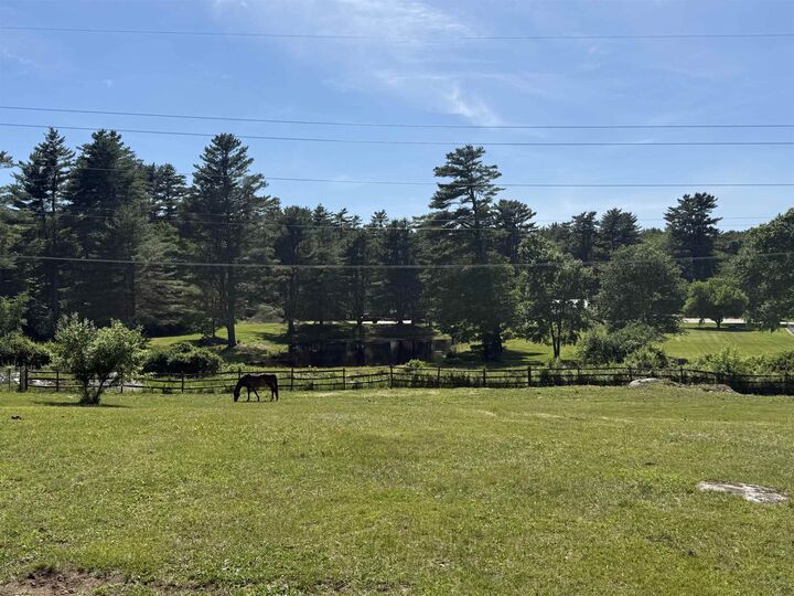 Property Photo:  64 N Amherst Road  NH 03110 
