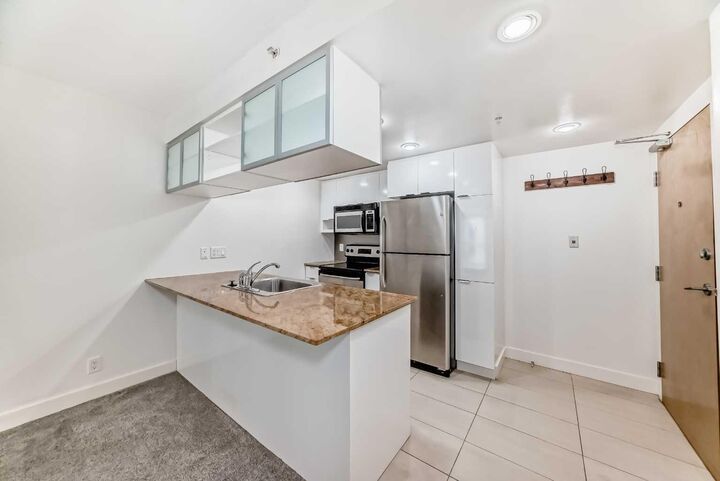 Property Photo:  1110 11 Street SW 909  AB T2R 1S5 
