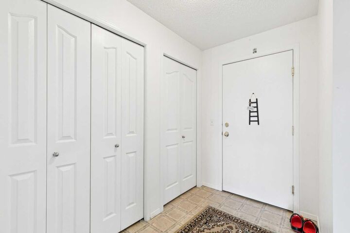 Property Photo:  12 Cimarron Common 2407  AB T1S 2G1 