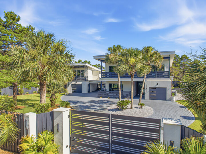 Property Photo:  114 E Surfside Drive  FL 32459 