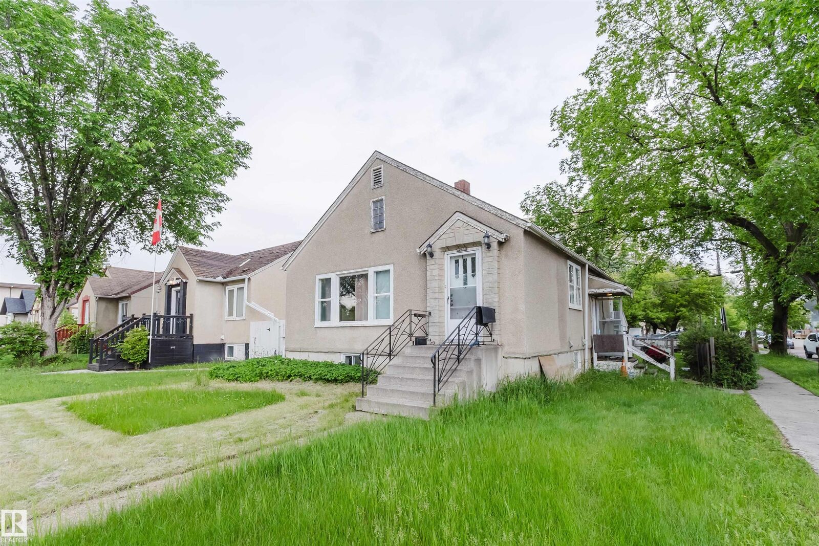 Property Photo:  7703 109 Street NW  AB T6G 1C4 
