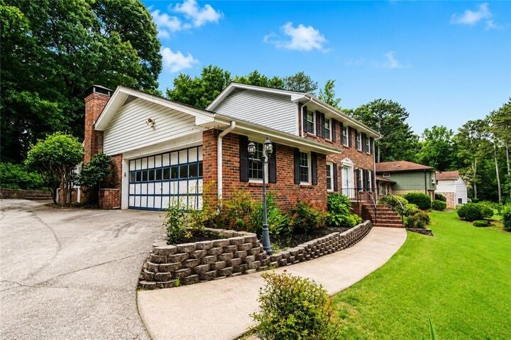 Property Photo:  1683 Oak Ridge Circle SW  GA 30087 