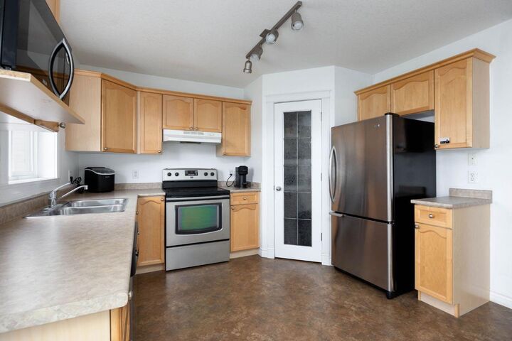 Property Photo: 182 McDougall Crescent AB T9K 2P7