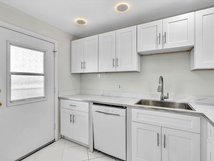 Property Photo:  6161 NW 2nd Avenue  FL 33487 