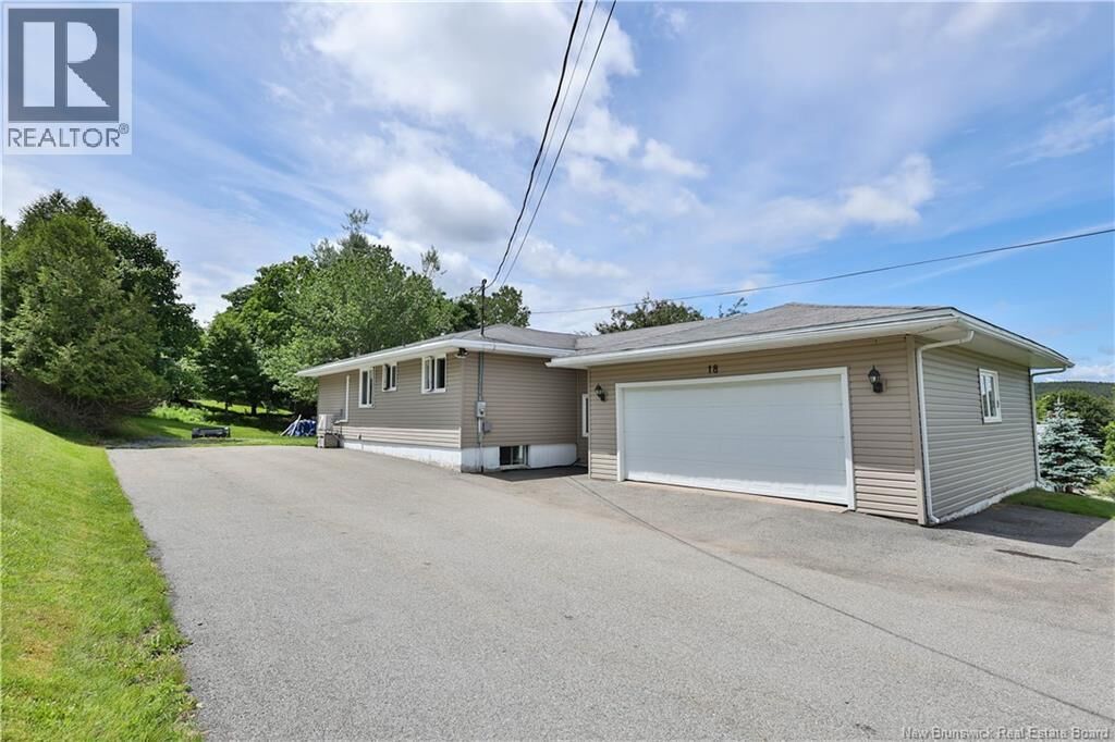 Property Photo:  18 Quispamsis Road  NB E2E 1M2 