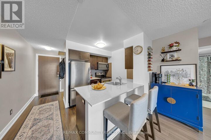 Property Photo:  2 Eva Road 1227  ON M9C 0A9 