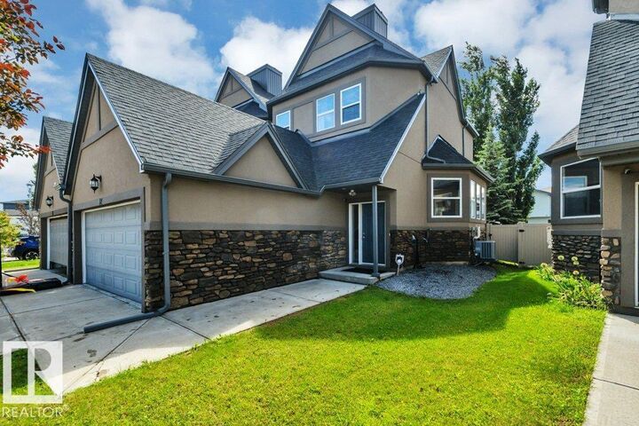 Property Photo:  1720 Garnett Point(E) NW 12  AB T5T 4C4 