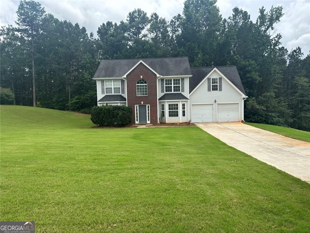 Property Photo: 1885 Winding Crossing Trail GA 30213