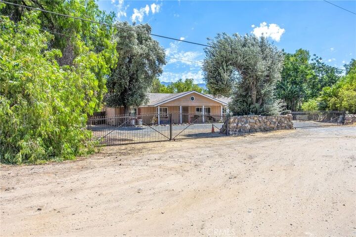 Property Photo:  9099 Cajalco  CA 92881 