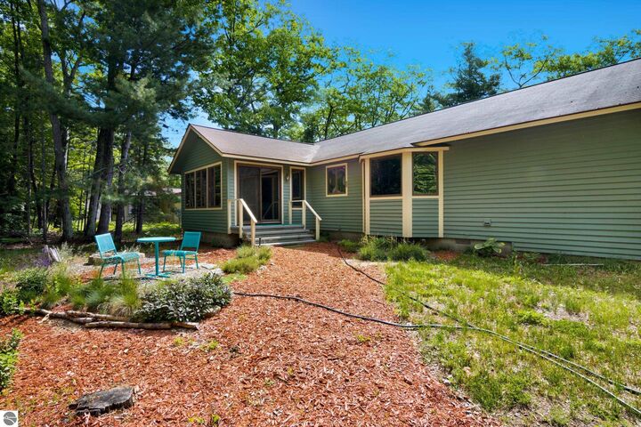 Property Photo:  13023 N Forest Beach Shores  MI 49670 