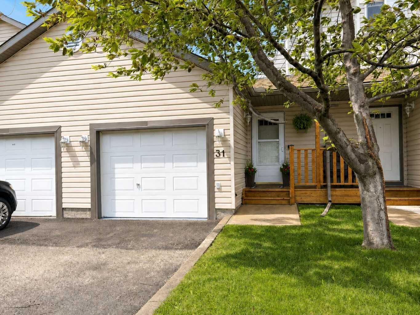 Property Photo: 156 Canoe Drive SW 31 AB T4B 2Z3