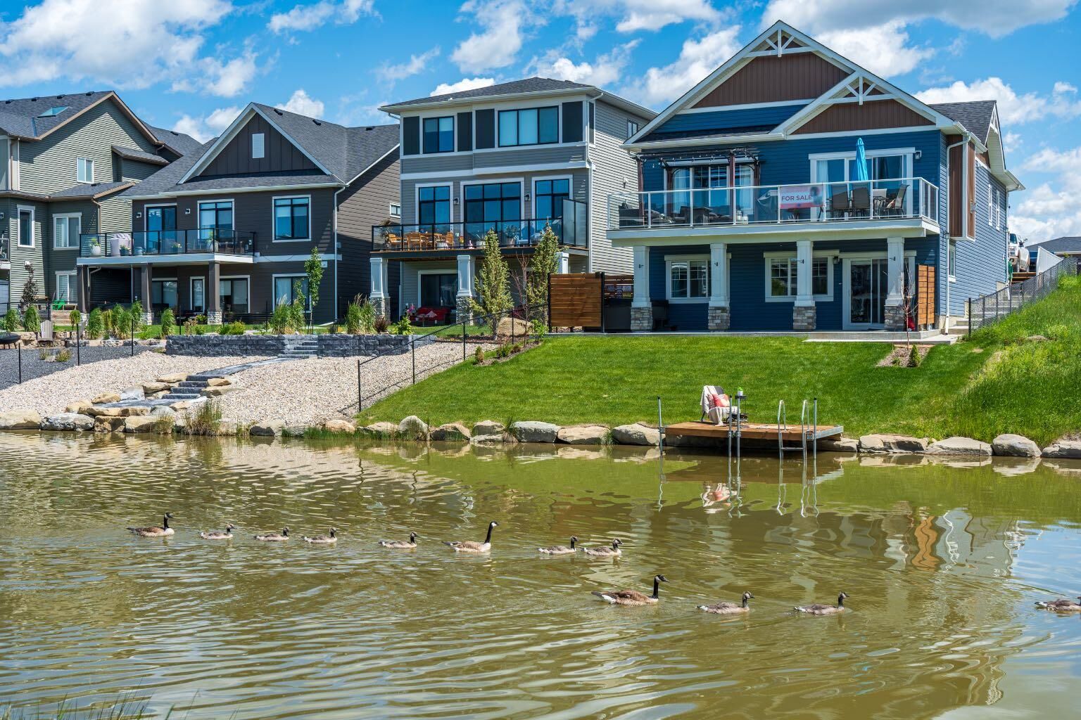 Property Photo: 1147 Bayside Drive SW AB T4B 5E7