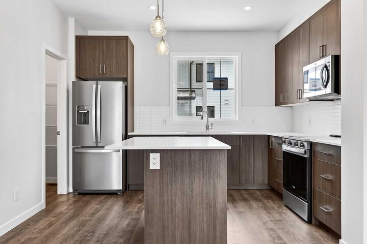 Property Photo: 1750 Rangeview Drive SE 204 AB T3S 0X3