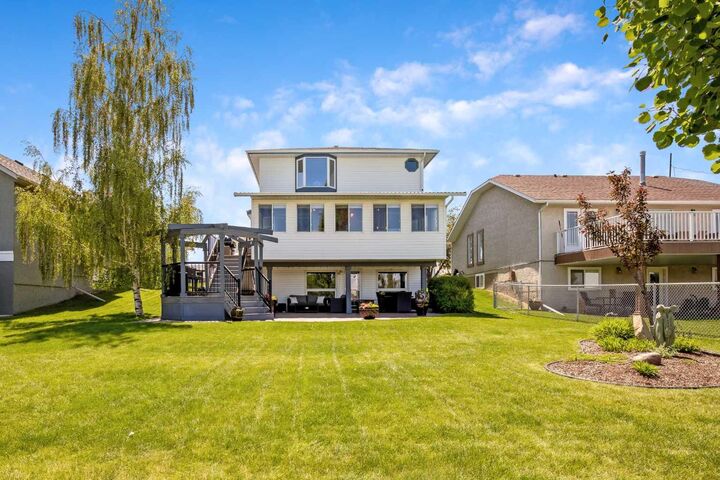 Property Photo:  1120 High Country Drive NW  AB T1V 1E2 