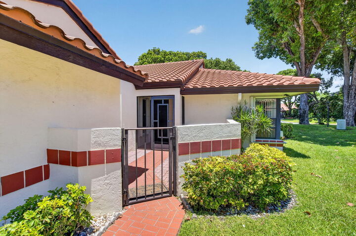Property Photo:  10546 Beach Palm Court B  FL 33437 