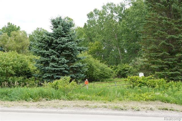 Property Photo:  11349 Hogan Road  MI 48436 
