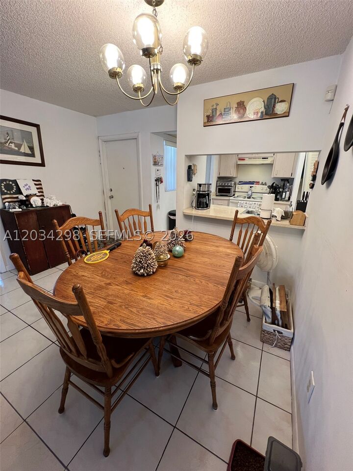 Property Photo:  9710 Hammocks Blvd 204-31  FL 33196 