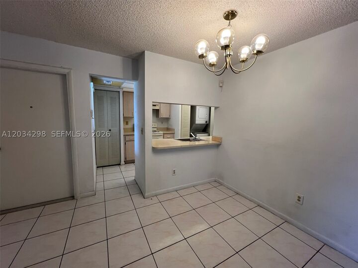 Property Photo:  9710 Hammocks Blvd 204-31  FL 33196 