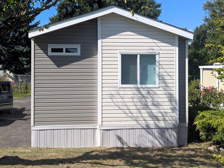 Property Photo: 8220 King George Boulevard 104 BC V3W 6B1