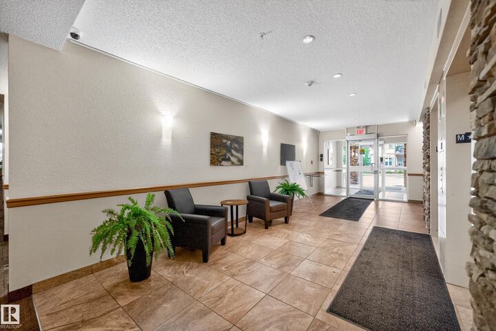 Property Photo: 2045 Grantham Crest NW 215 AB T5T 3X6