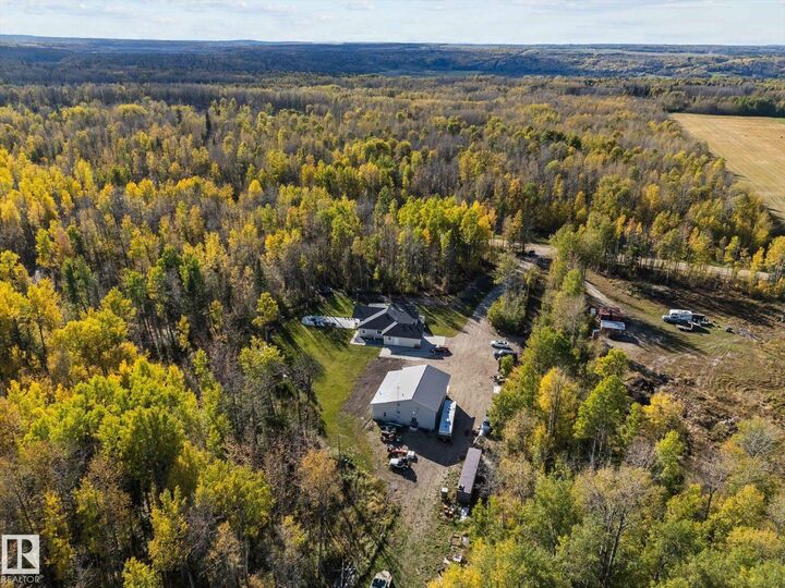 Property Photo:  48115B Rge Road 72  AB T7A 2A2 