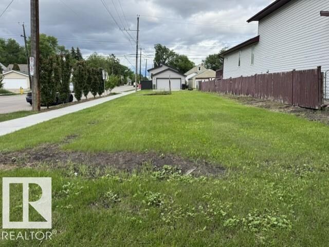Property Photo:  11447 90 Street NW  AB T5B 3X8 