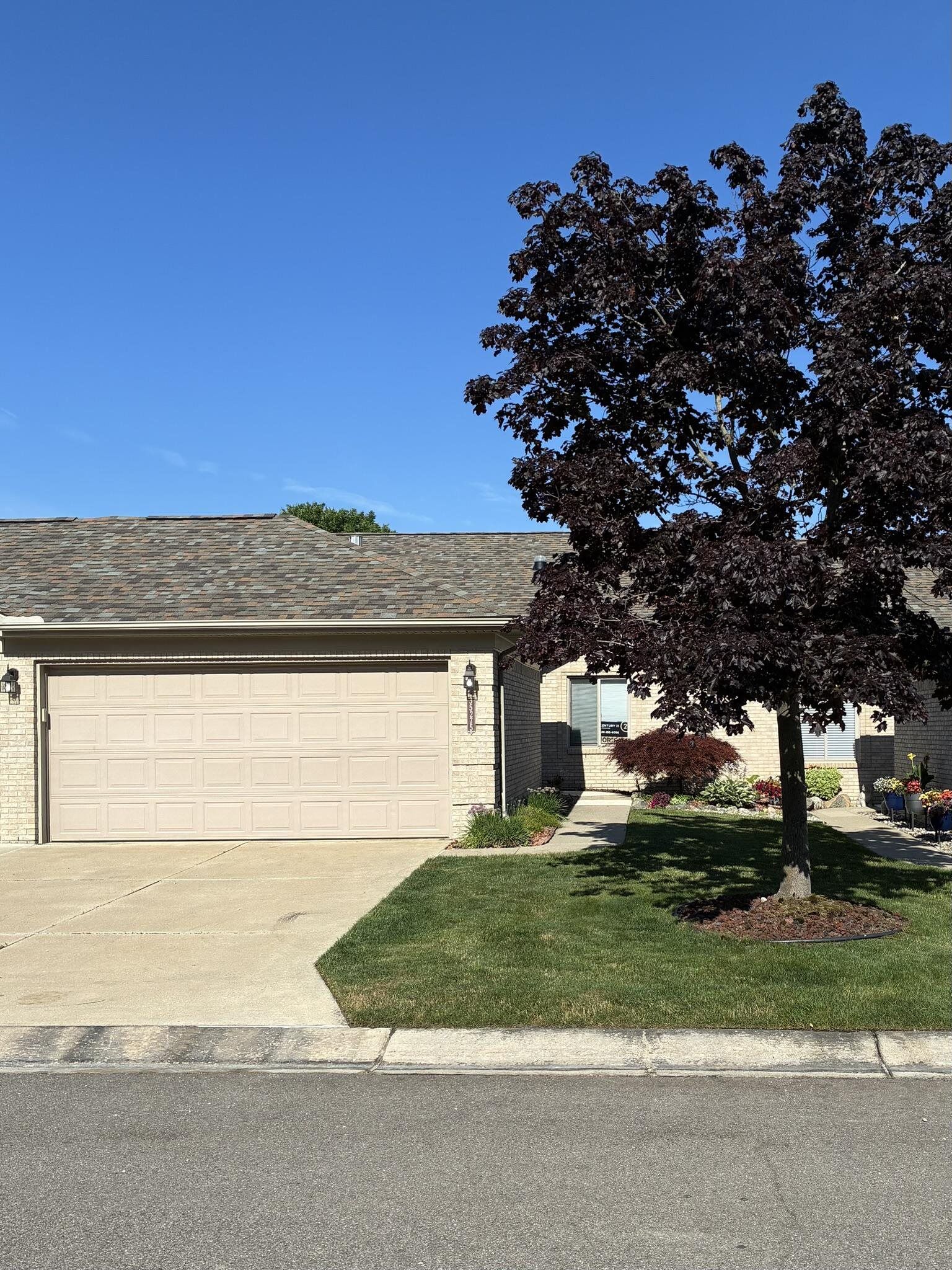 Property Photo: 35275 Silver Maple Drive Unit 37, Bldg 7 MI 48035