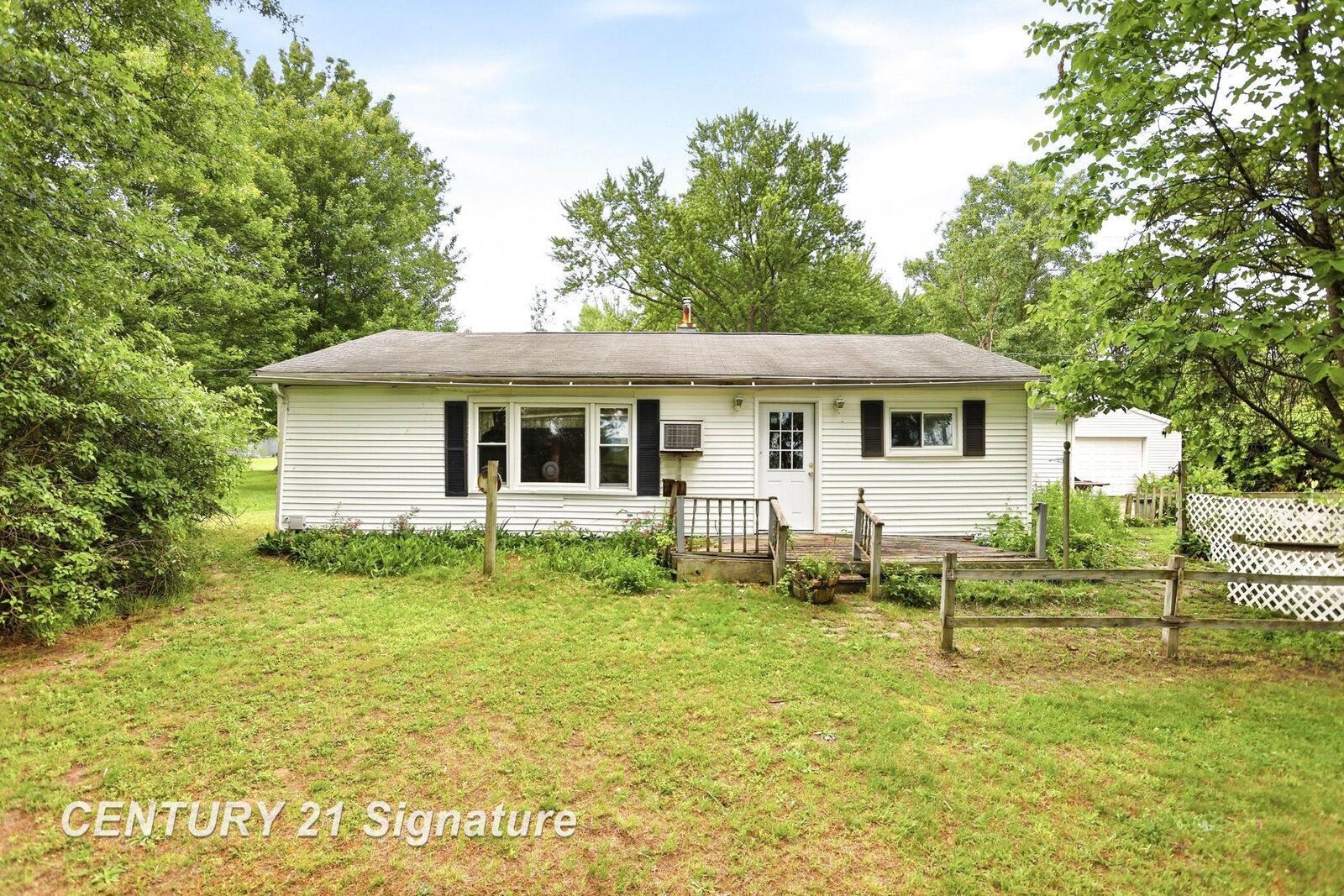 Property Photo:  12097 Swan Creek Road  MI 48609 