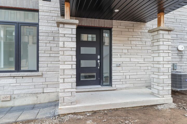 Property Photo:  155 Equestrian Way W 126  ON N3E 0E8 