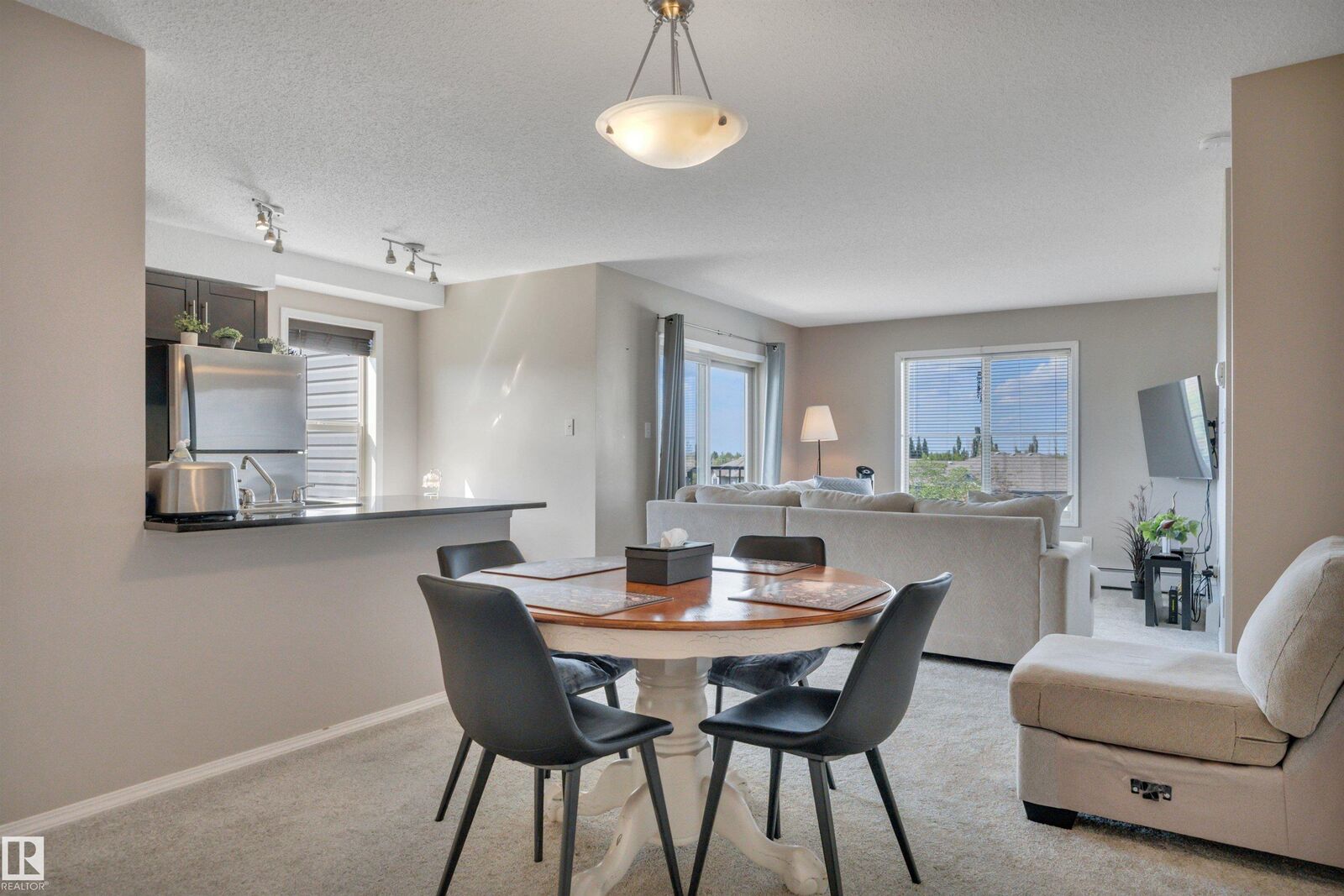 Property Photo:  11812 22 Avenue SW 402  AB T6W 2A2 