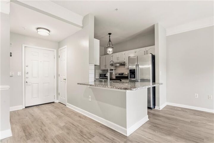 Property Photo:  2700 Pine Tree Road NE 2303  GA 30324 