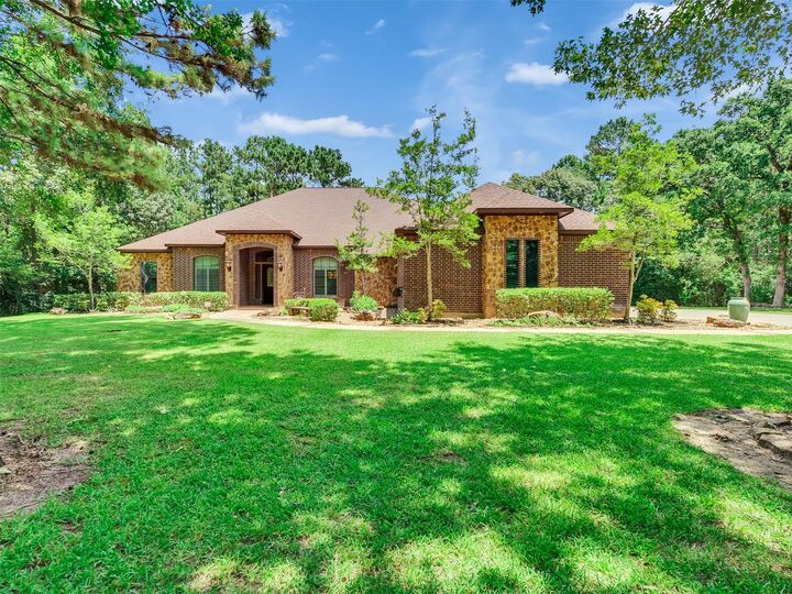 Property Photo:  10137 Crown Ranch Boulevard  TX 77316 
