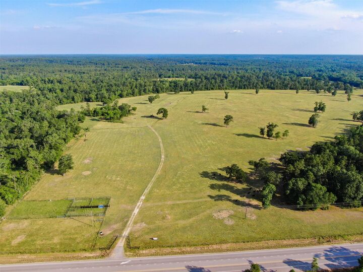 Property Photo: 6600 State Highway 150 W TX 77331