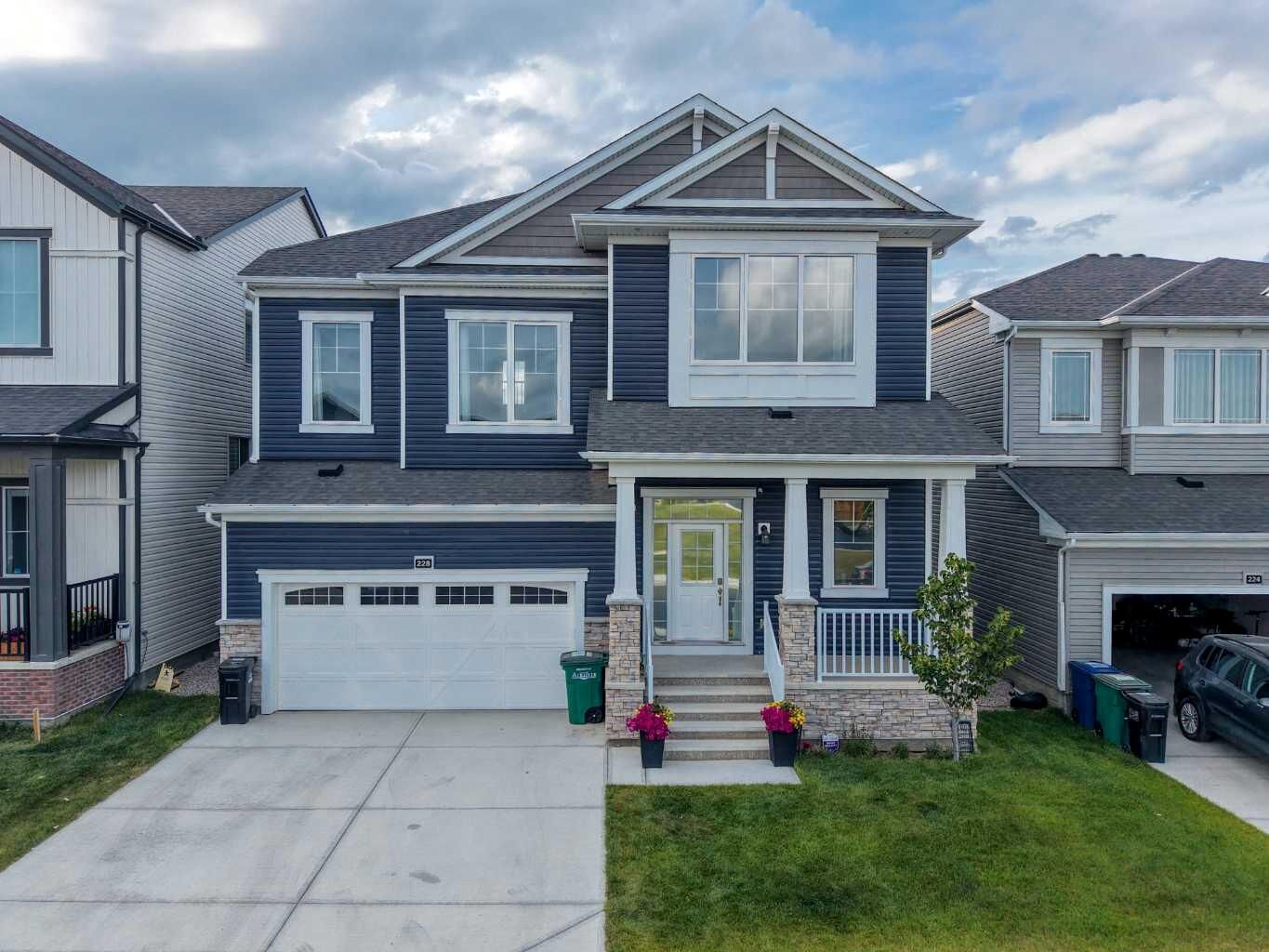 Property Photo: 228 Windrow Link SW AB T4B 5L5
