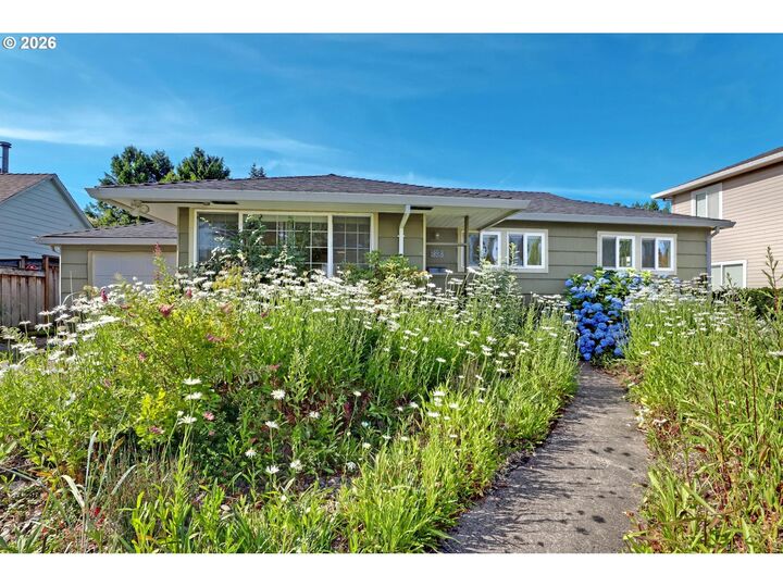Property Photo:  10910 NE Eugene St  OR 97220 