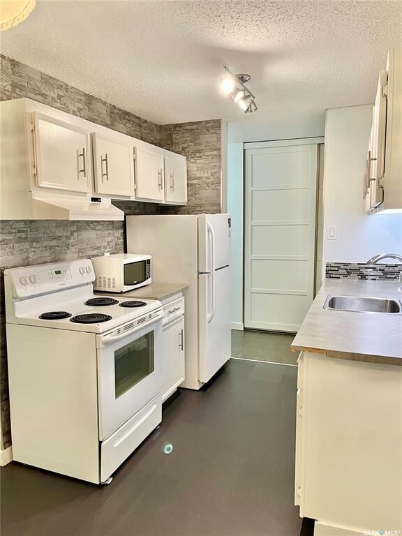 Property Photo:  207C Tait Place 150  SK S7H 5L8 