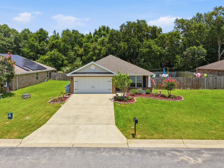 Property Photo: 5976 Milan Drive FL 32571