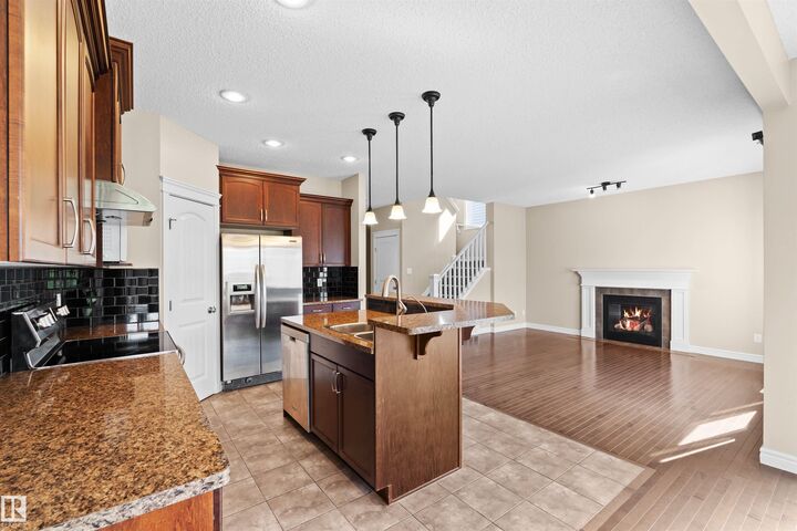 Property Photo: 11711 16 Ave SW SW AB T6W 1M9