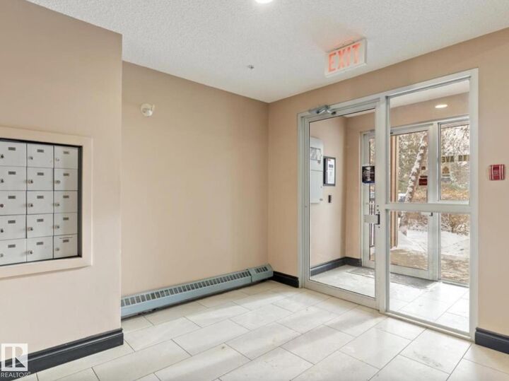 Property Photo:  12110 119 Avenue NW 103  AB T5L 5G9 
