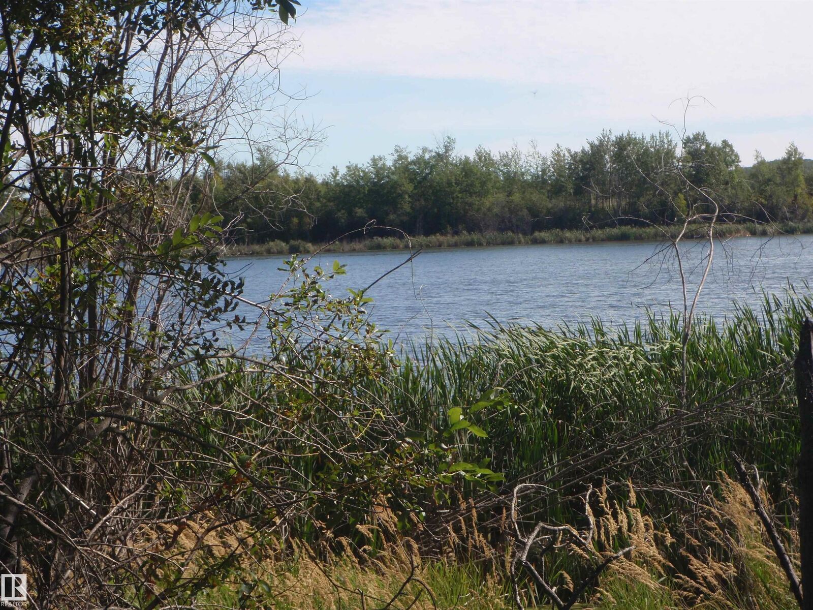 Property Photo:  Rr62 W5th R6 T59 S22 SE  AB T7N 1N3 
