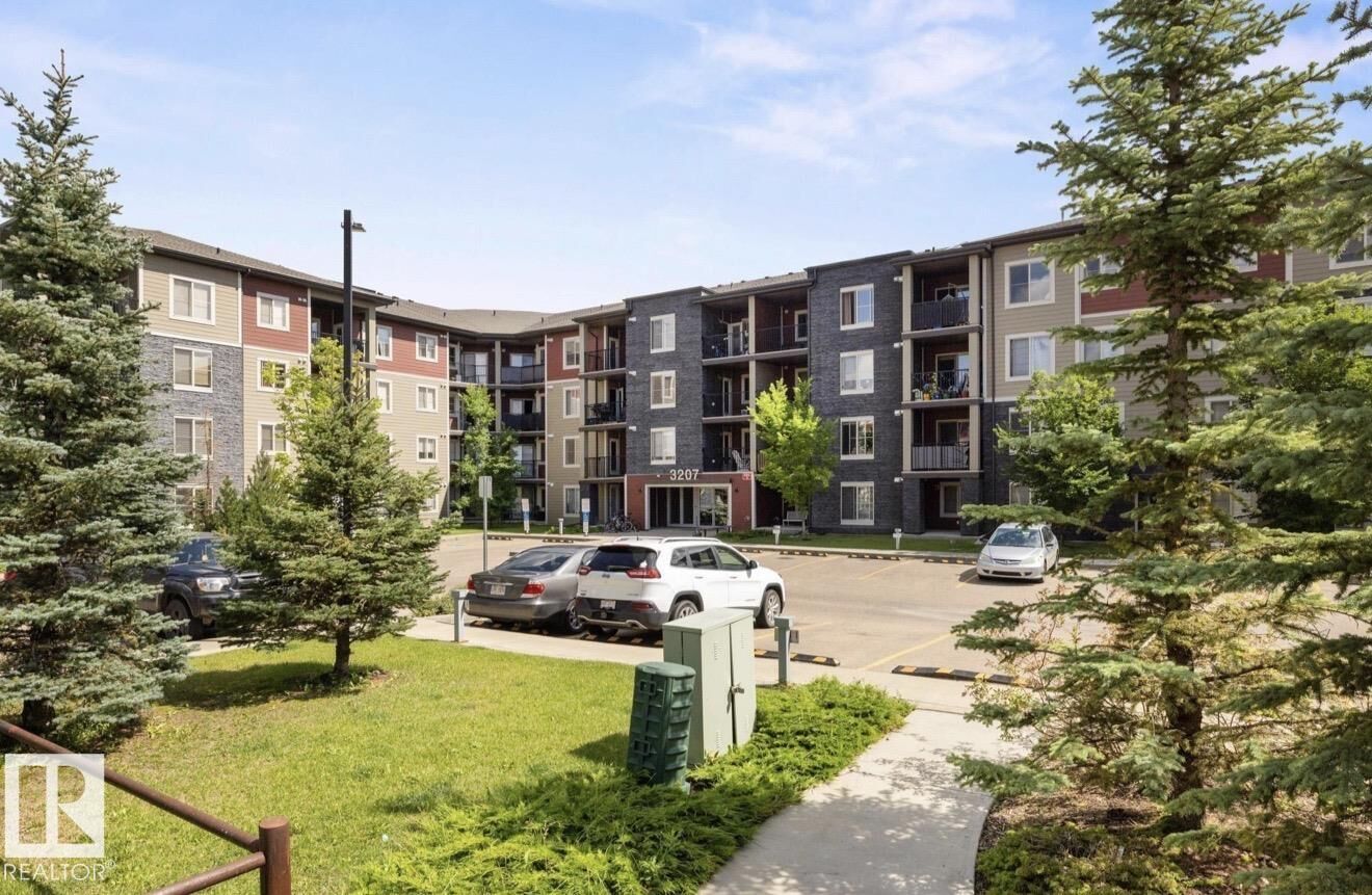 Property Photo: 3207 James Mowatt Trail SW 211 AB T6W 3L6