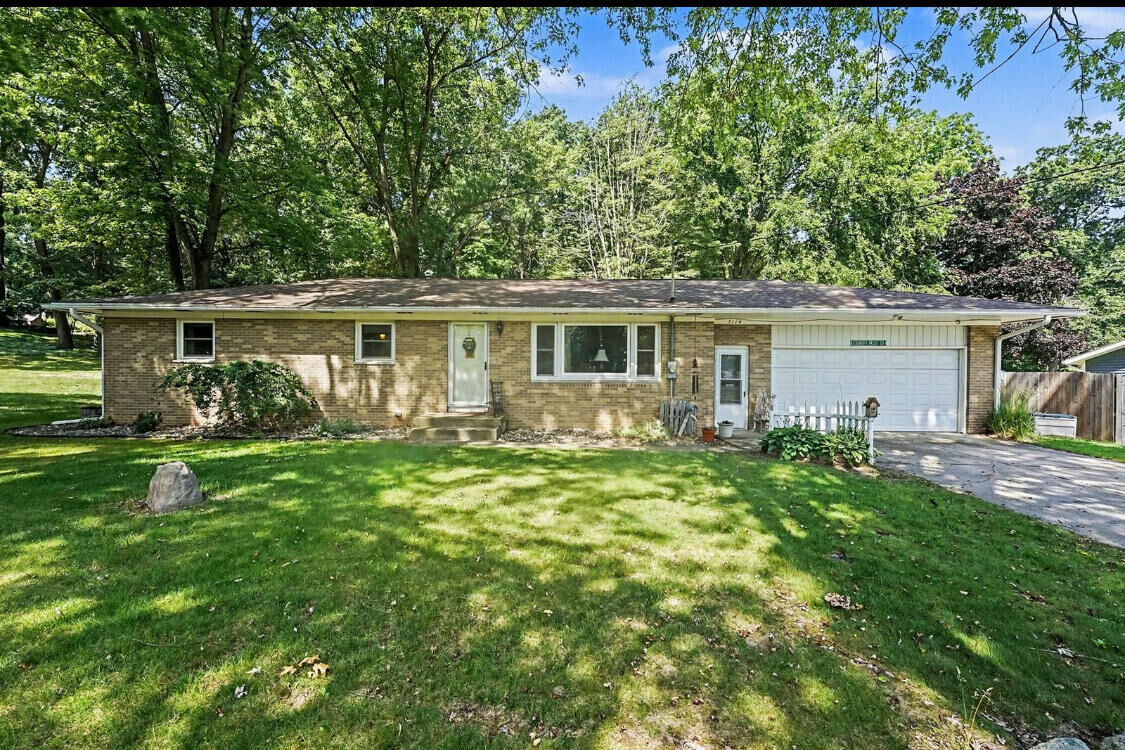 Property Photo:  7114 Kay Drive  MI 48838 