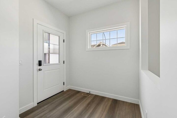 Property Photo: 64 Creekstone Manor SW AB T2X 5W3