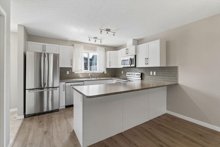 Property Photo: 268 Sunset Road AB T4C 0H4