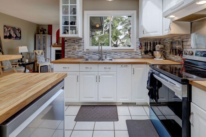 Property Photo: 128 Pineland Place NE AB T1Y 3K2